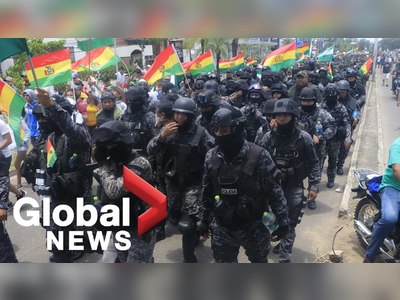 Police join protesters as Bolivia's president calls it 'coup attempt'