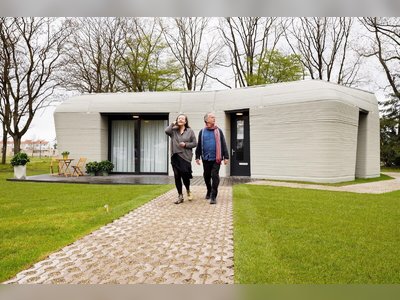 A Dutch Couple Are the First Tenants of This Boulder-Shaped 3D-Printed Home