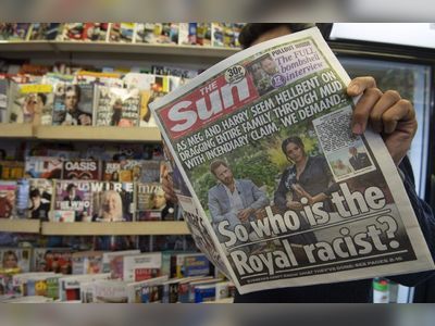 The value of Rupert Murdoch’s racy The Sun newspaper is written down to nothing