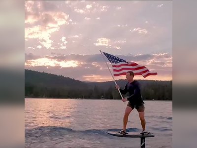 Mark Zuckerberg trolled for surfing holding US flag on 4th of July: “Flying the flag of the country you’re trying to destroy”