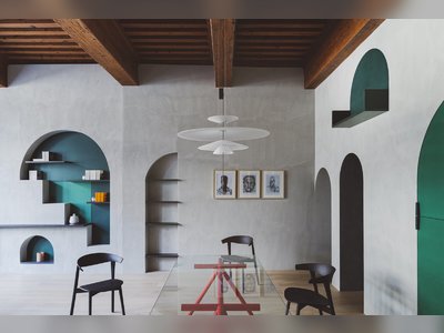 A 17th-Century Apartment in France Gets Modded With Curves and Color