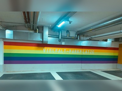 ‘That’s right straights, back of the bus!’: German car park ridiculed for installing rainbow-painted spaces for LGBT and migrants