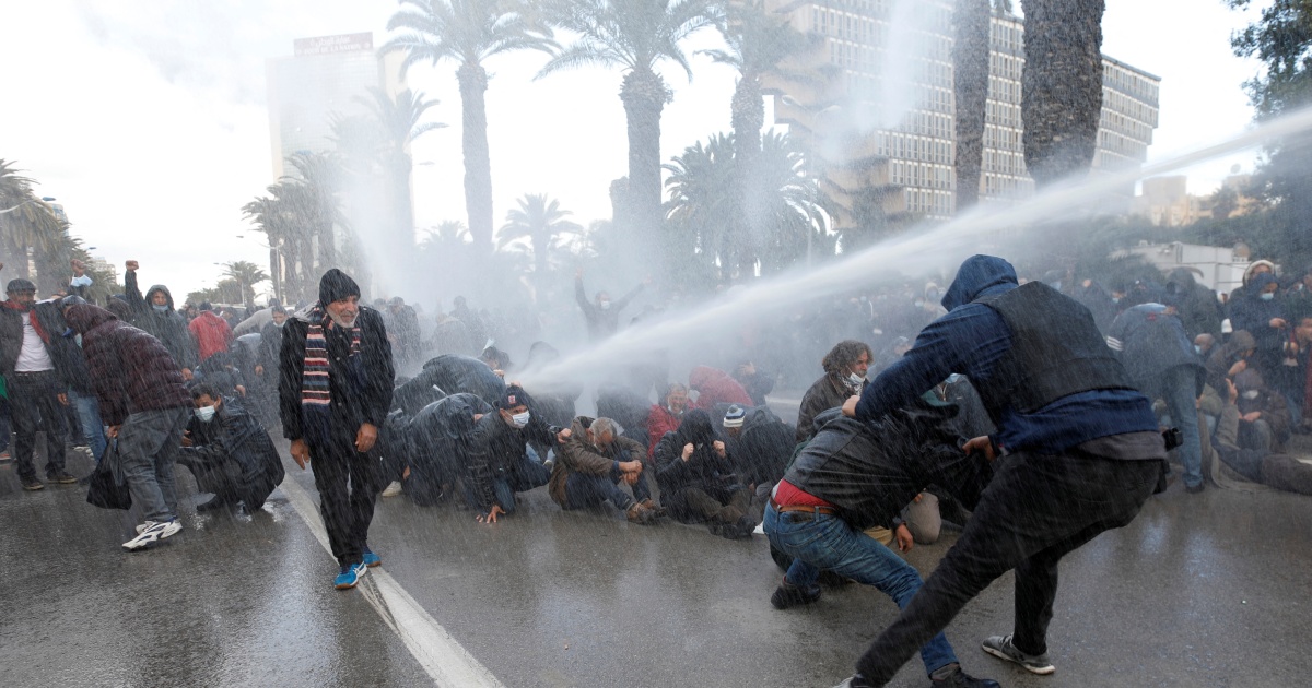 Tunisia police use water cannon to disperse protesters
