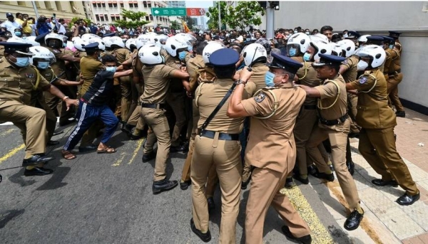 Sri Lanka deploys troops to enforce curfew after day of deadly unrest