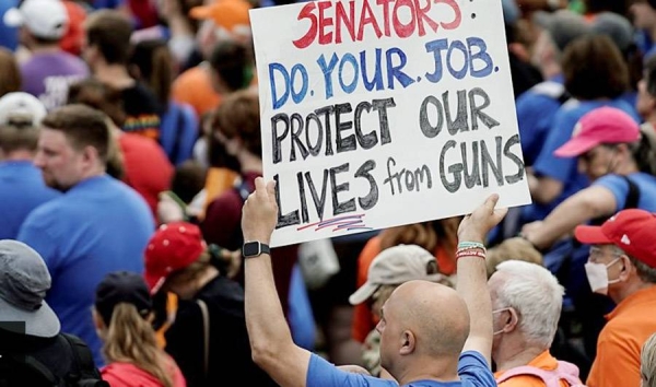 Tens of thousands rally for stricter US gun laws