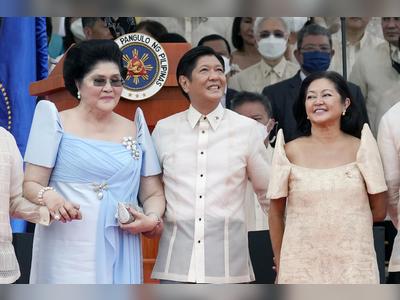 Marcos takes helm in Philippines, silent on father’s abuses