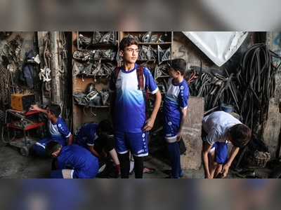 Photos: Child workers play their own Champions League in Syria