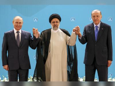 Putin, in Tehran, gets strong support from Iran over Ukraine