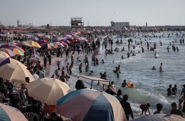 ‘The sea is more blue’: Gazans head to the beach after sewage cleanup