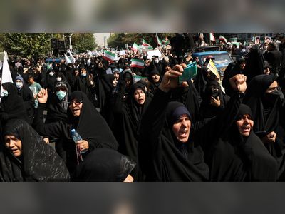 Iranian state-organised marchers call for execution of protesters