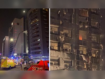 Families flee as fire breaks out in a 12-floor apartment building in Dubai
