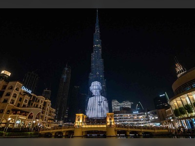 Dubai’s Burj Khalifa lights up with portrait of Britain’s Queen Elizabeth and flag