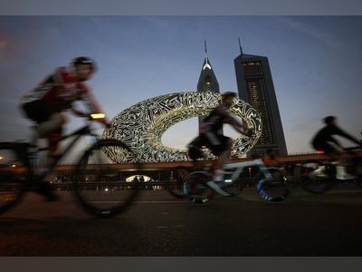 Tens of thousands ride bikes on typically busy Dubai highway