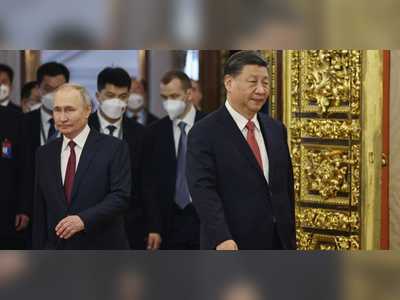 Putin hits back at claims by 'jealous people' that Russia is becoming dependent on China, days after meeting with Xi Jinping